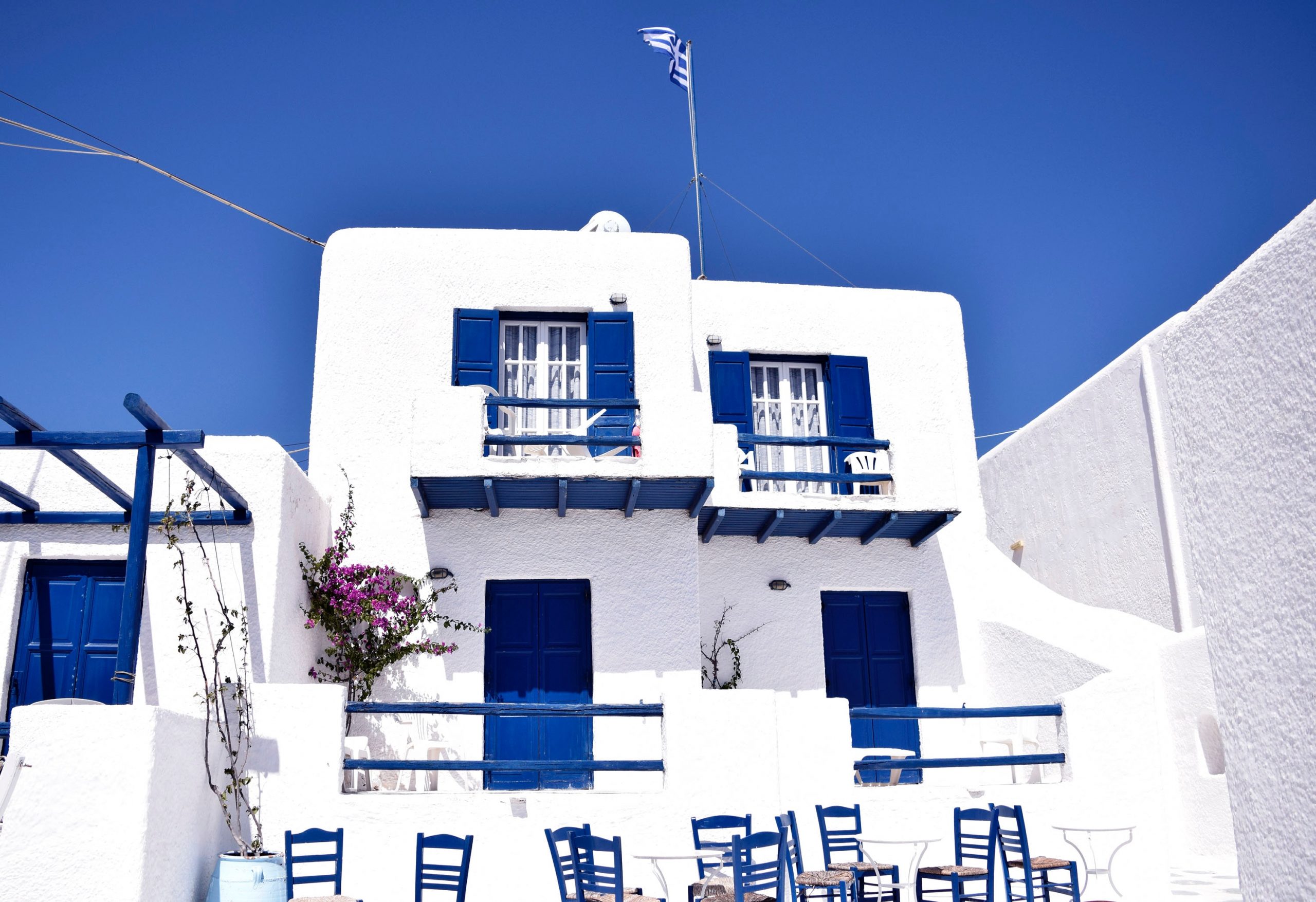 Klassiskt vitt stenhus i Mykonos, Grekland